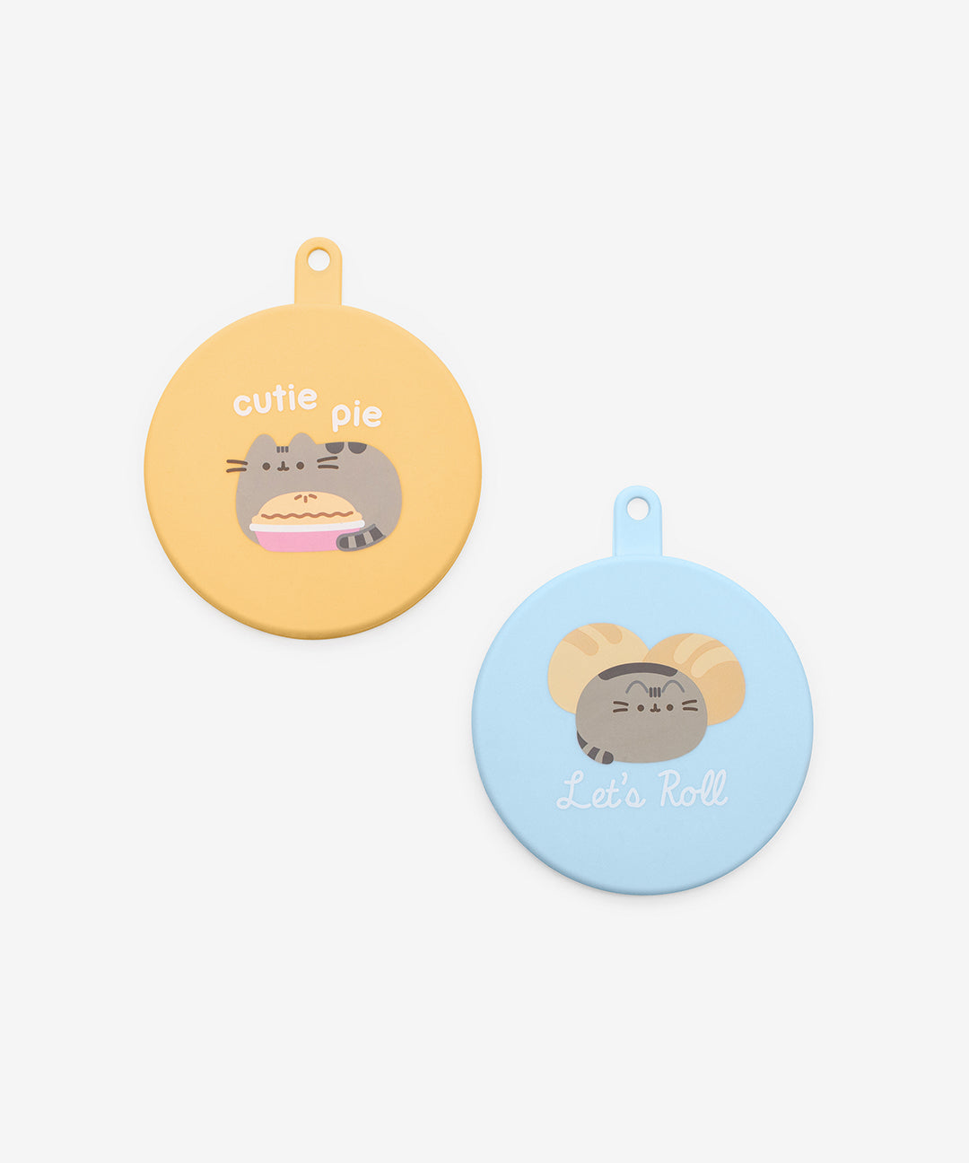 Two Pusheen pet food can covers that are yellow and blue. The silicone can covers have graphics printed on the top. 
