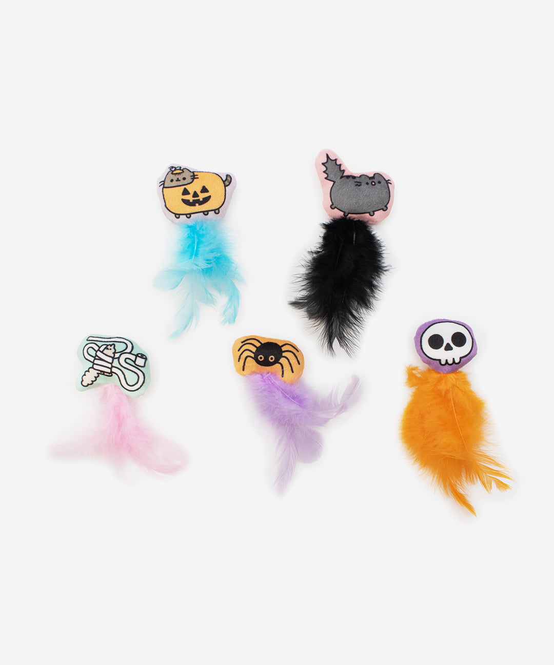 Front view of all plush toys included in the Pusheen Pet Halloween Pumpkins Plush Toys 5-Pack. The set includes 5 Pusheen Halloween-themed plush toys with feathers attached to the bottom of the toy.
