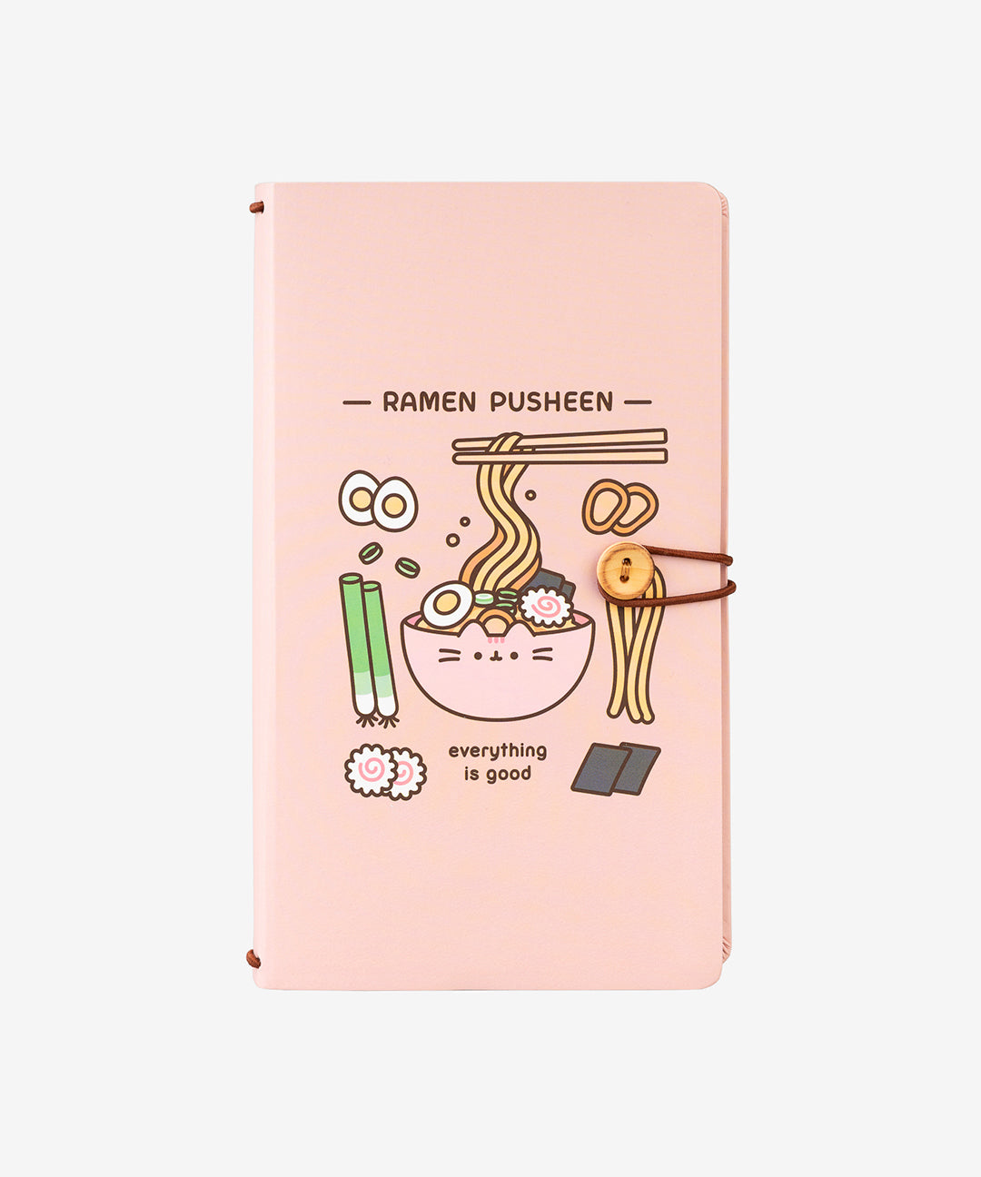 Pusheen Ramen Notebook has a pink cover with various ramen noodle meal ingredients including egg, scallion, noodles, and more. The notebook closes with an elastic band and button closure.