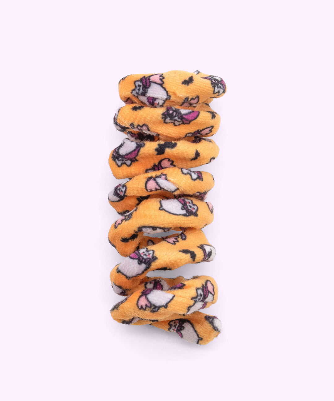 Close-up of orange spiral cat toy that has a pattern of Vampurr Pusheen with black bat graphics.